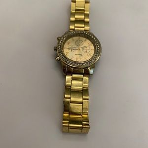 Gold watch with a diamond bezel